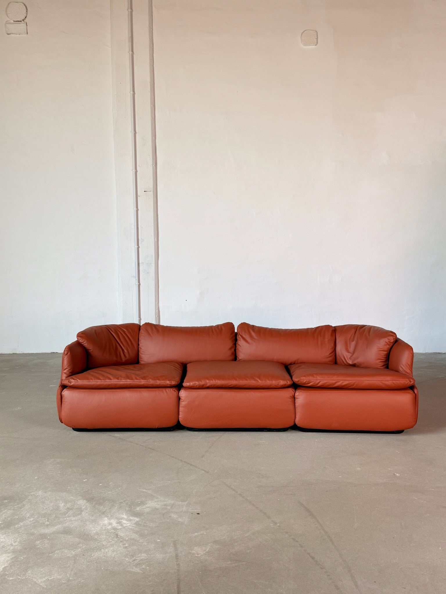 CONFIDENTIAL terracotta brown leather sofa