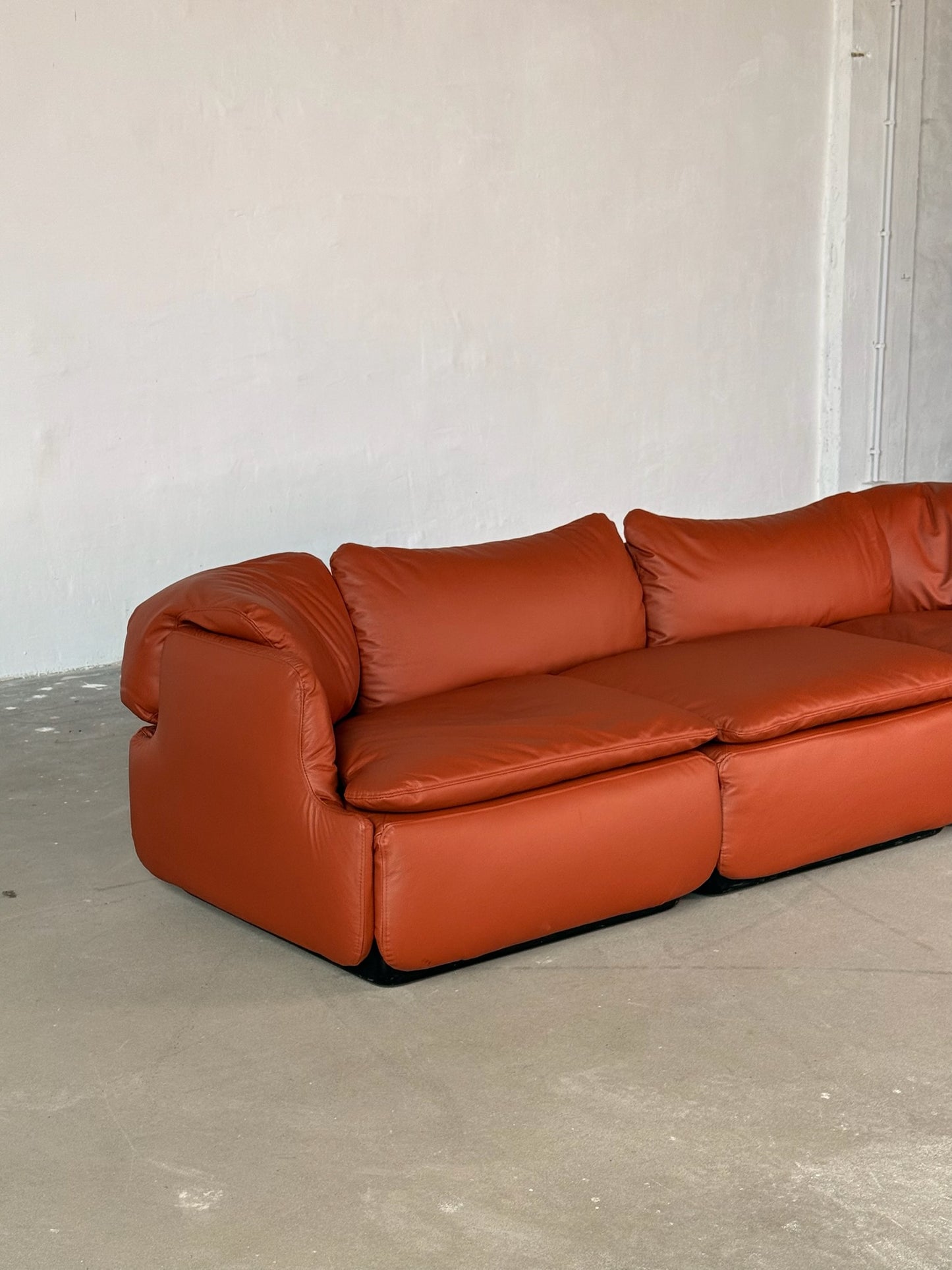 CONFIDENTIAL terracotta brown leather sofa