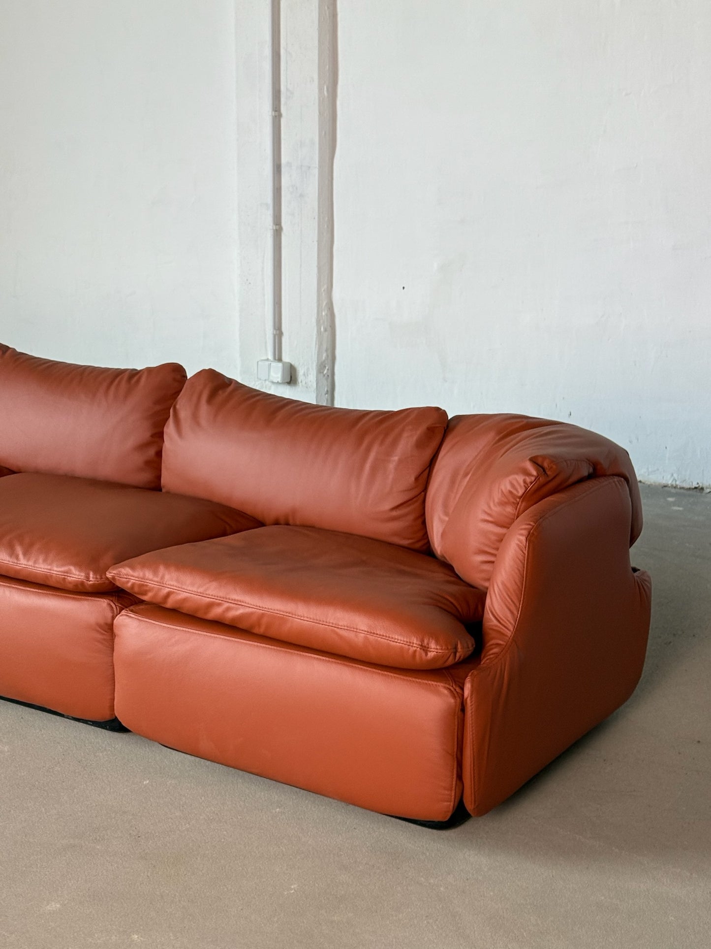 CONFIDENTIAL terracotta brown leather sofa