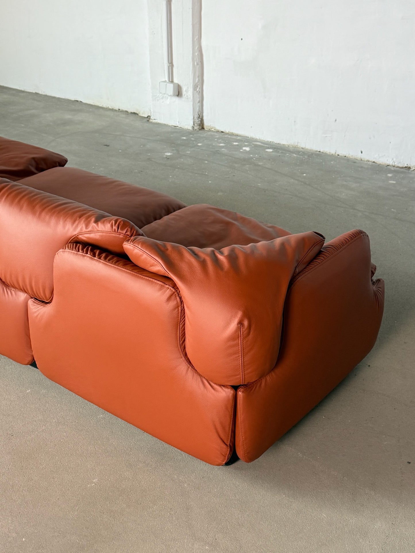 CONFIDENTIAL terracotta brown leather sofa
