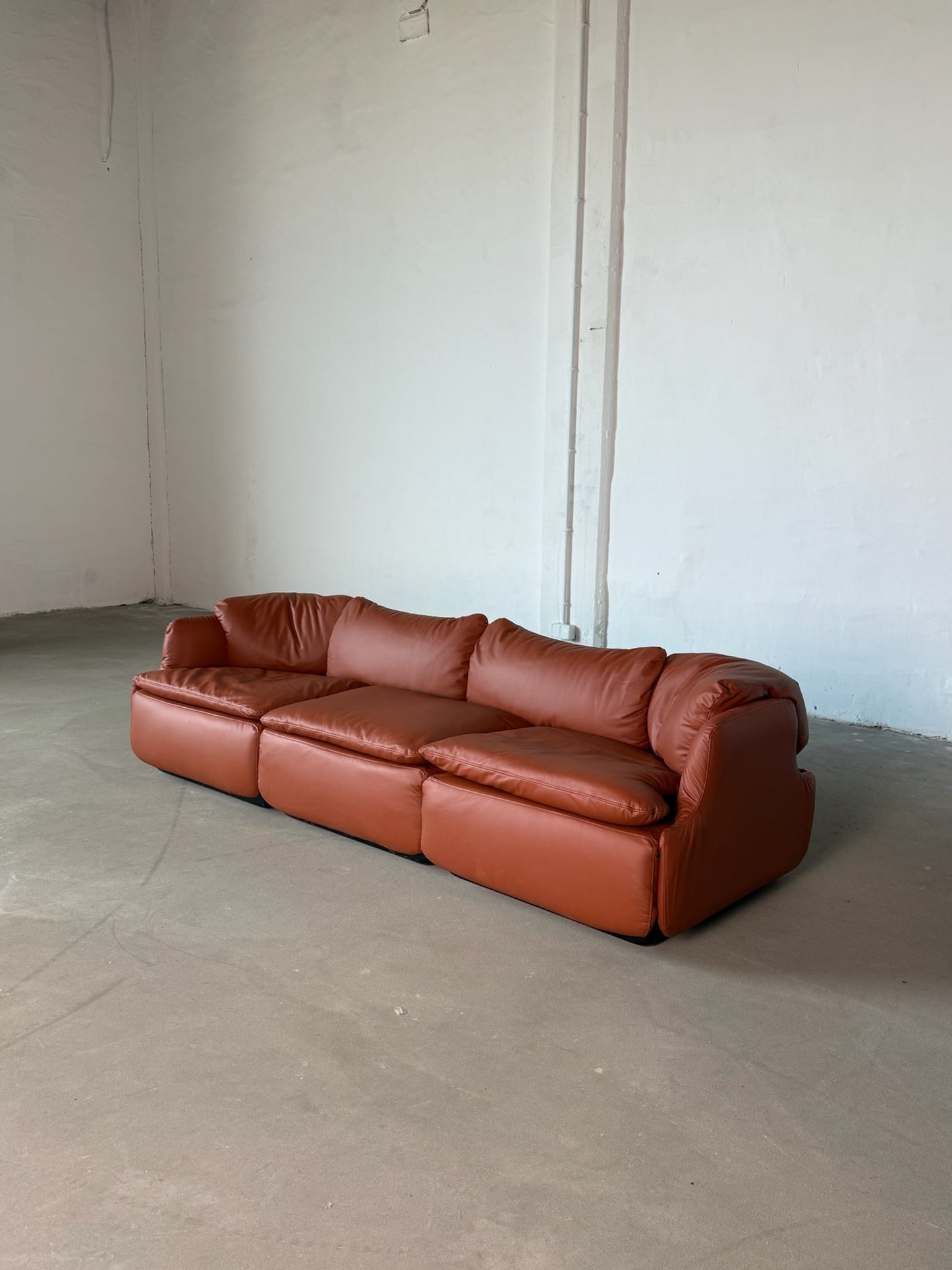 CONFIDENTIAL terracotta brown leather sofa