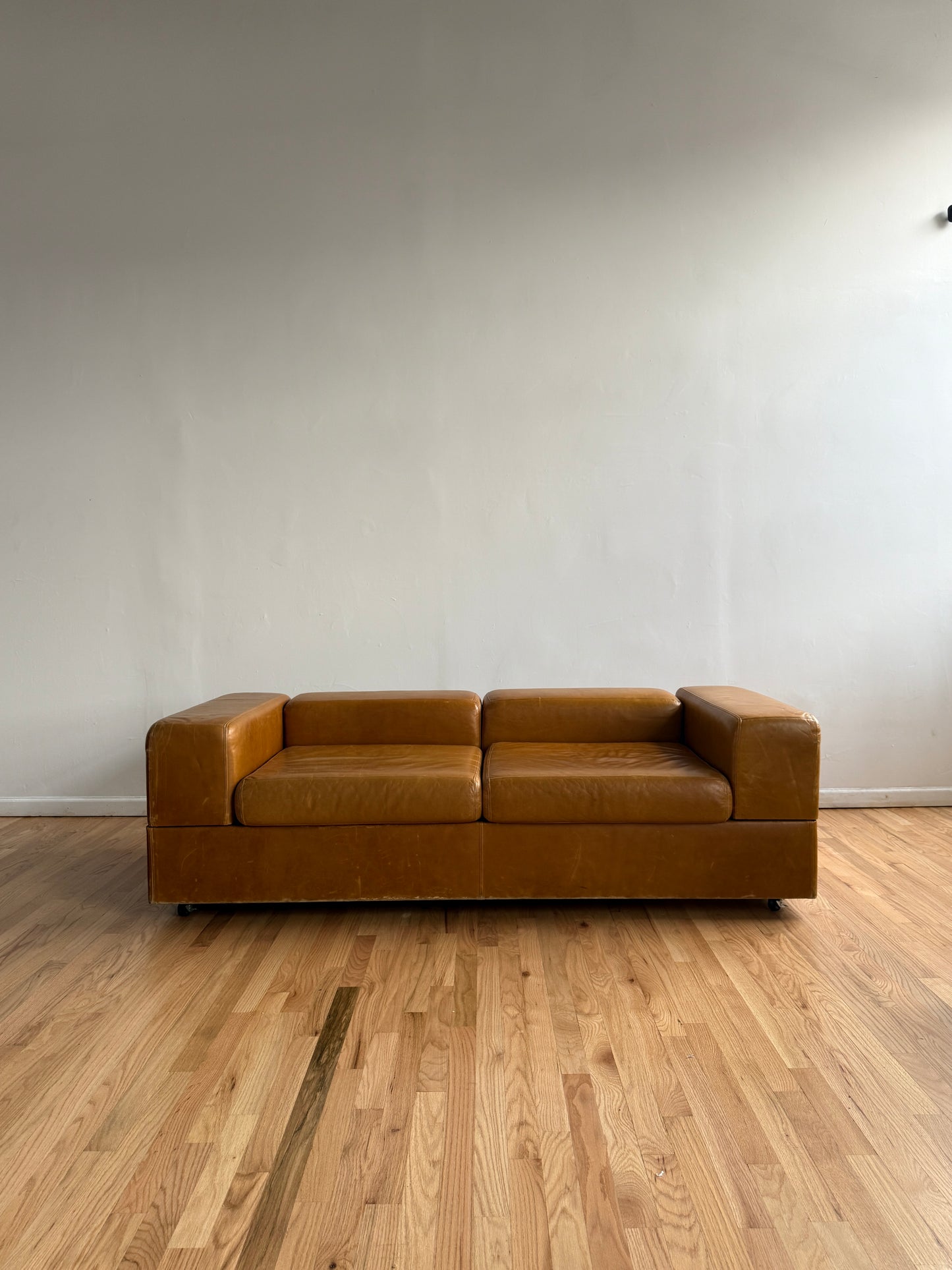 Tito Agnoli caramel leather daybed sofa, 1960s