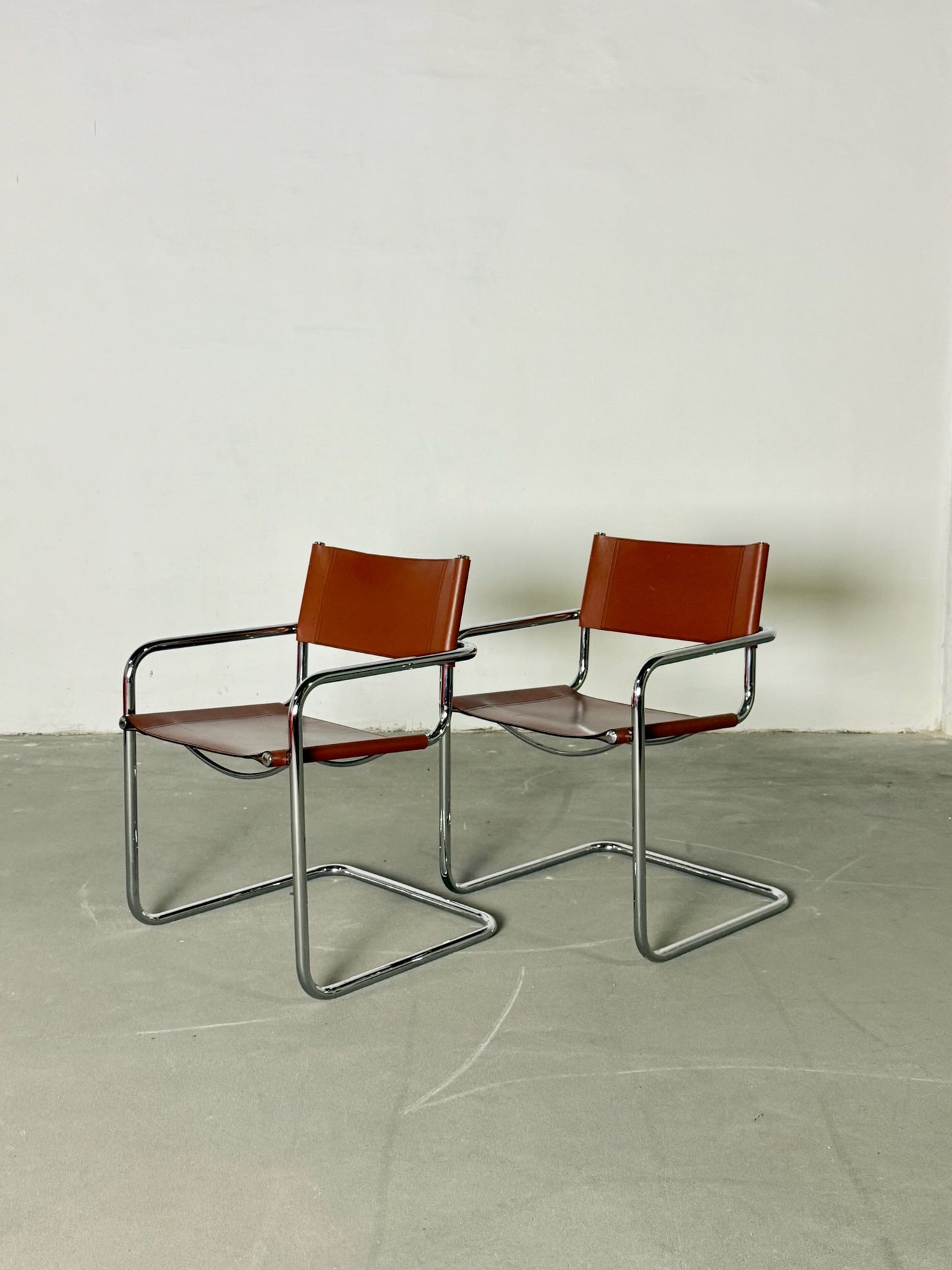 S34 Fasem brown leather chairs