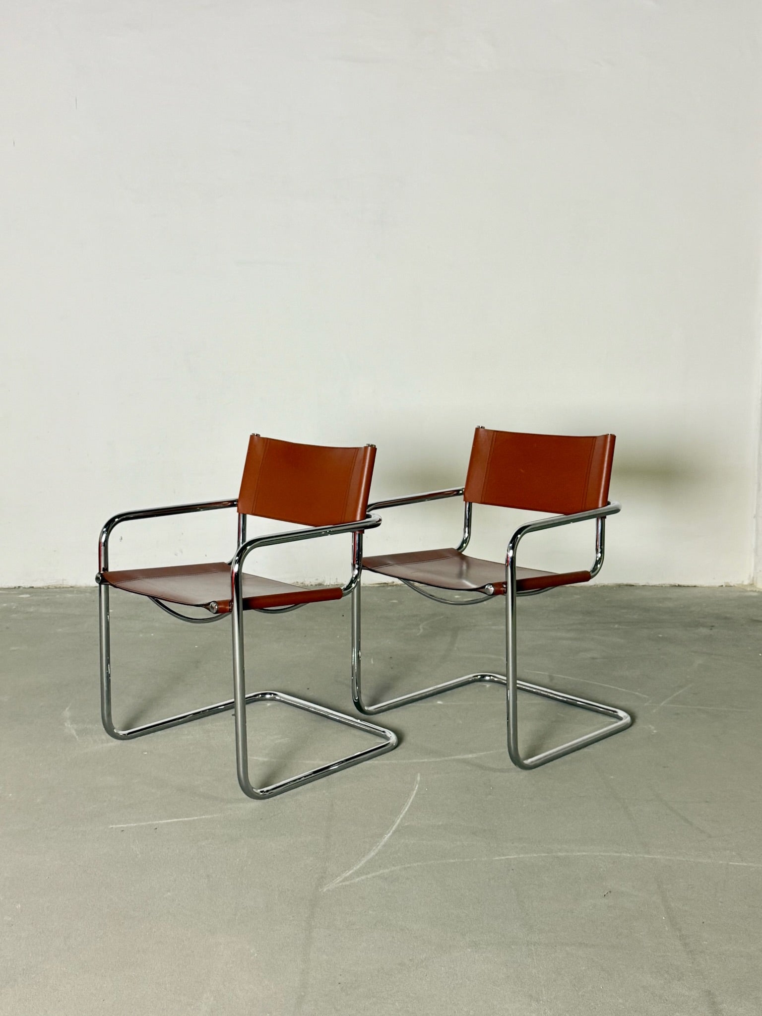 S34 Fasem brown leather chairs