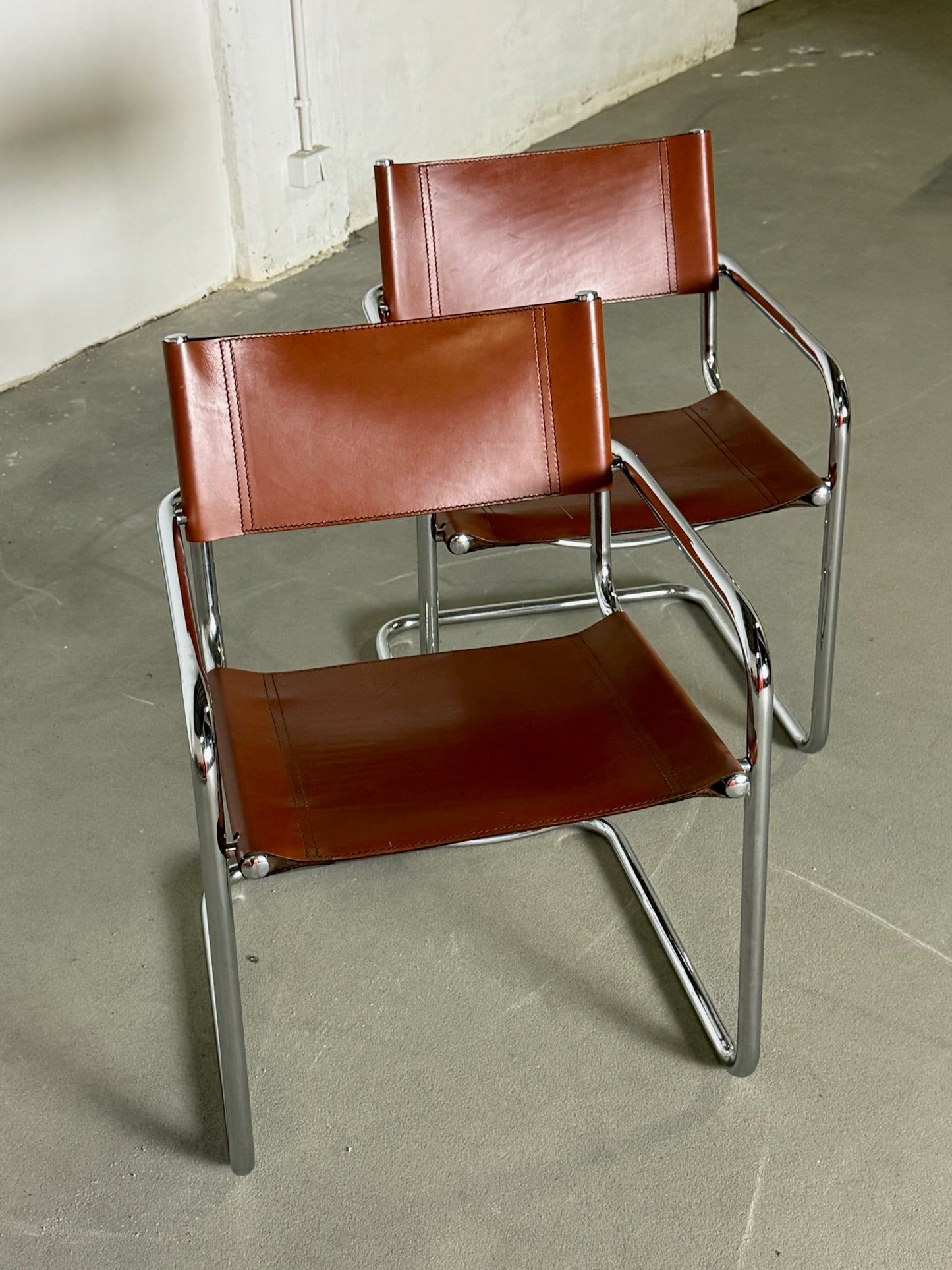 S34 Fasem brown leather chairs