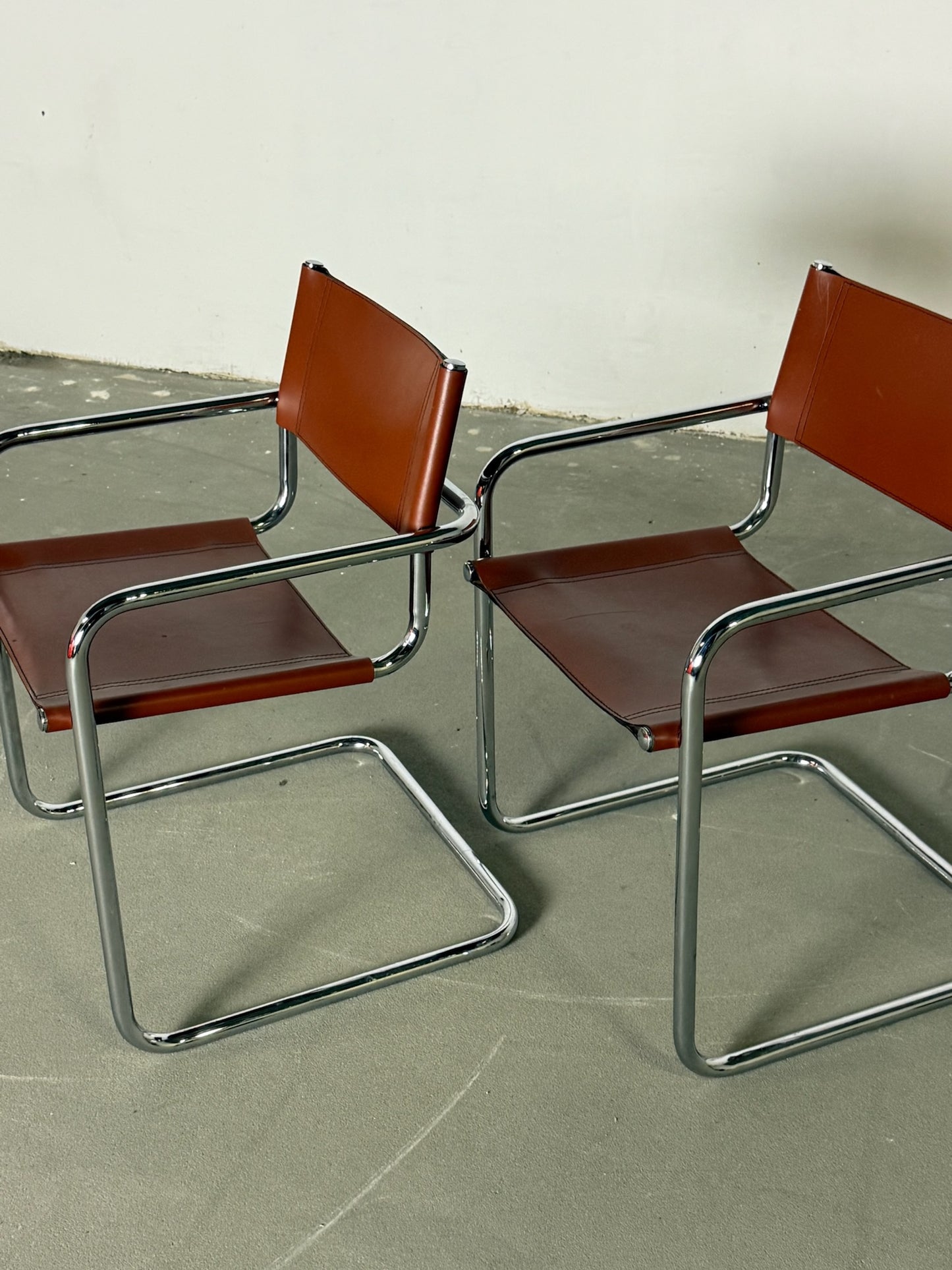 S34 Fasem brown leather chairs