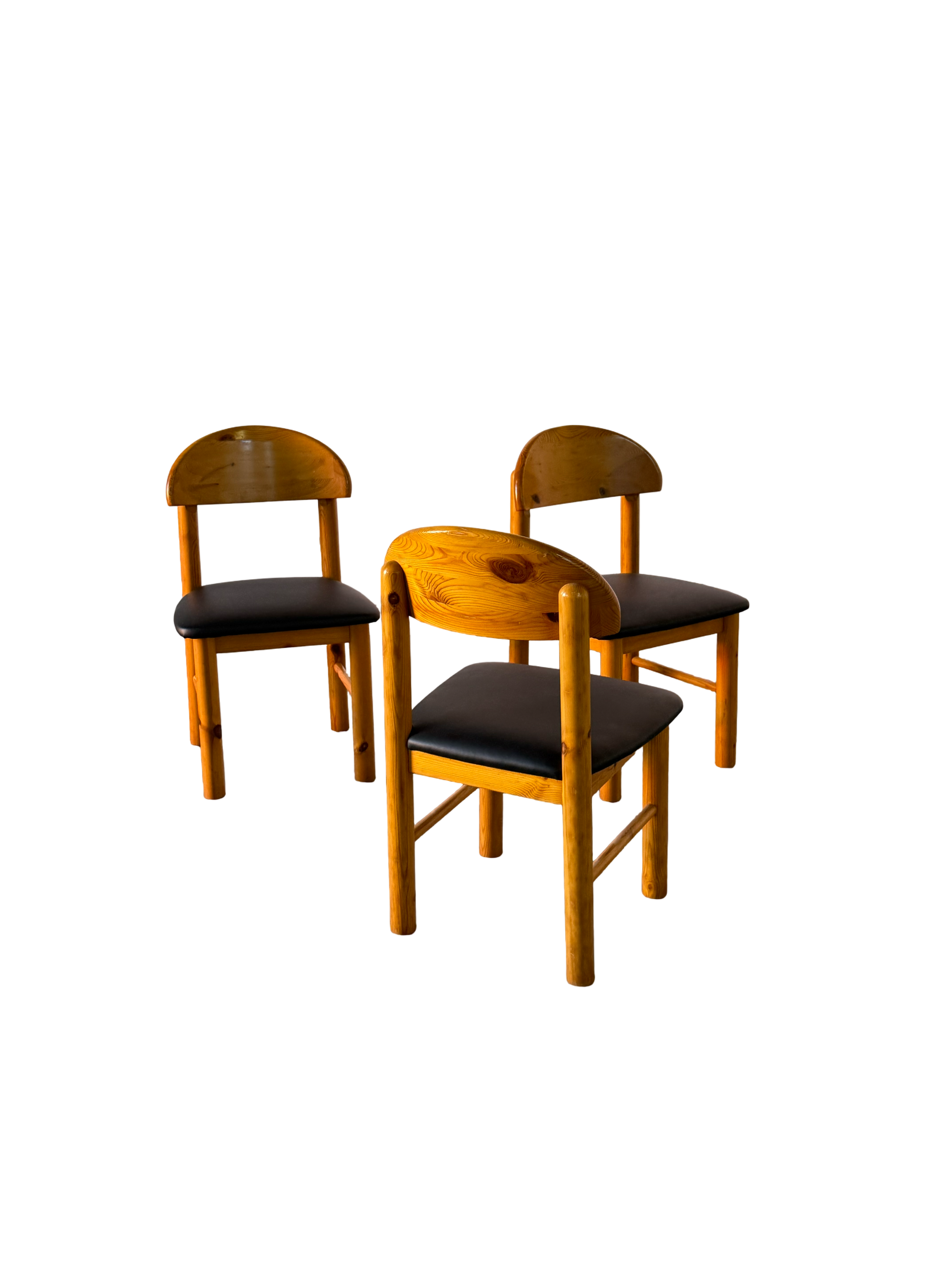 Wooden Daumiller chairs with black leather seats
